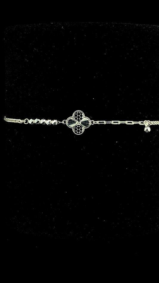 925 sterling silver asymmetric bracelet with engraved quatrefoil clover charm, faceted bead chain and paperclip chain with ball drop — The Clover Asymmetric Bracelet by The White Kala