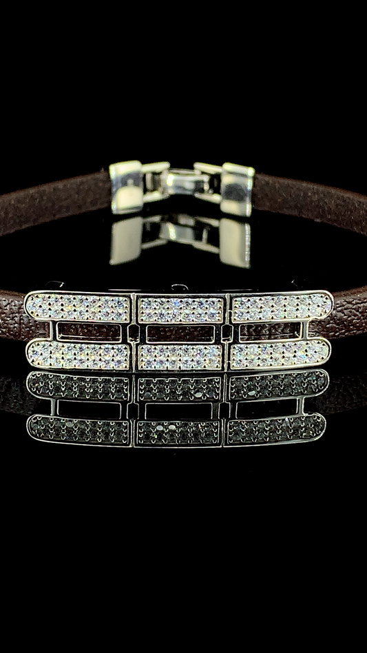 925 sterling silver geometric triple bar bracelet embedded with cubic zirconia stones on a brown leather strap by The White Kala.