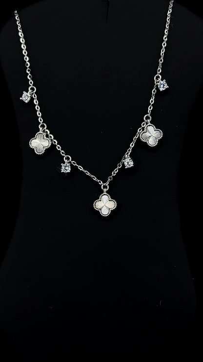 925 sterling silver Quatrefoil Garland necklace with engraved clover charms and white Cubic Zirconia solitaire drops by The White Kala