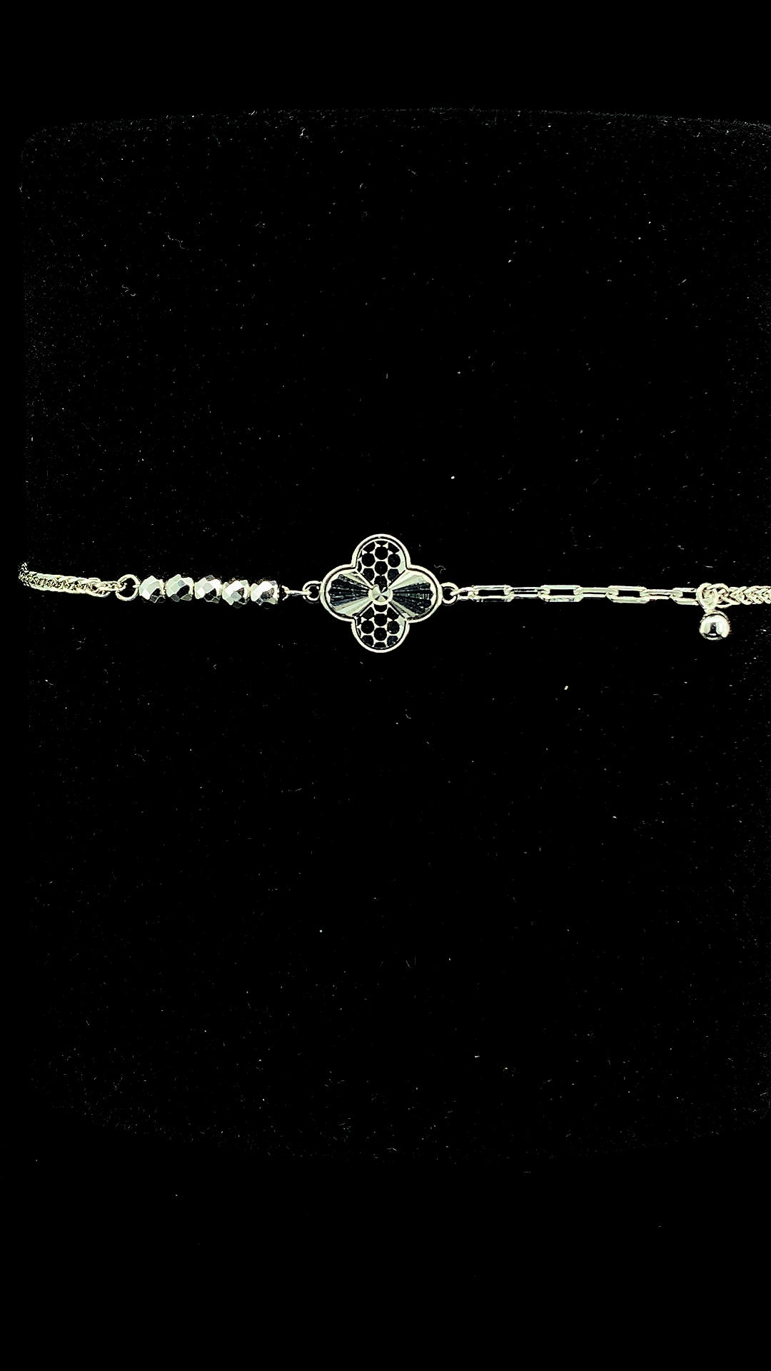 925 sterling silver asymmetric bracelet with engraved quatrefoil clover charm, faceted bead chain and paperclip chain with ball drop — The Clover Asymmetric Bracelet by The White Kala
