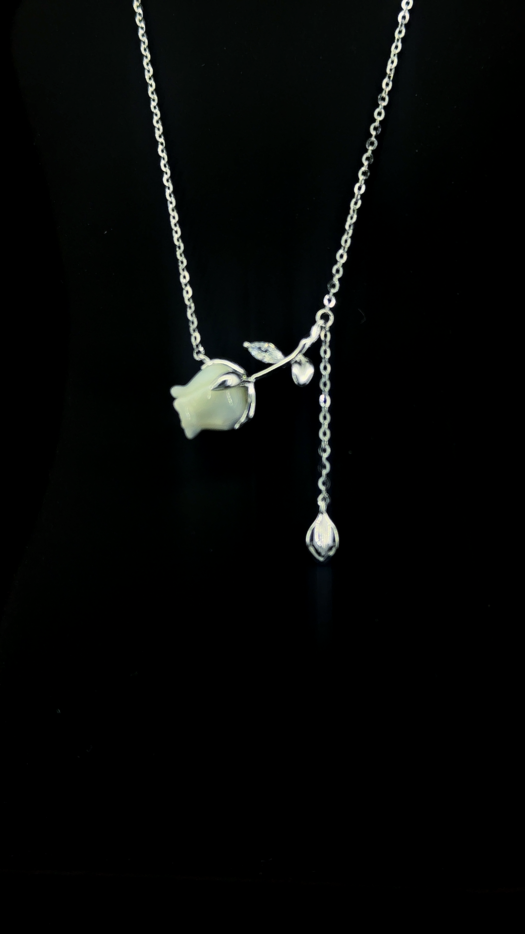 925 sterling silver lariat necklace with white rose bud charm, silver stem leaves and heart accent, and dangling miniature rose bud drop — The White Rose by The White Kala