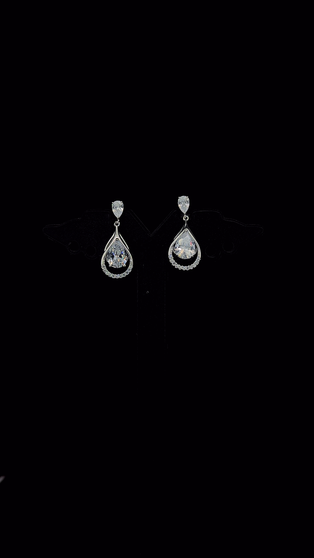 925 sterling silver pear CZ stud and open teardrop micropavé frame drop earrings with floating pear CZ solitaire — The Dewdrop by The White Kala
