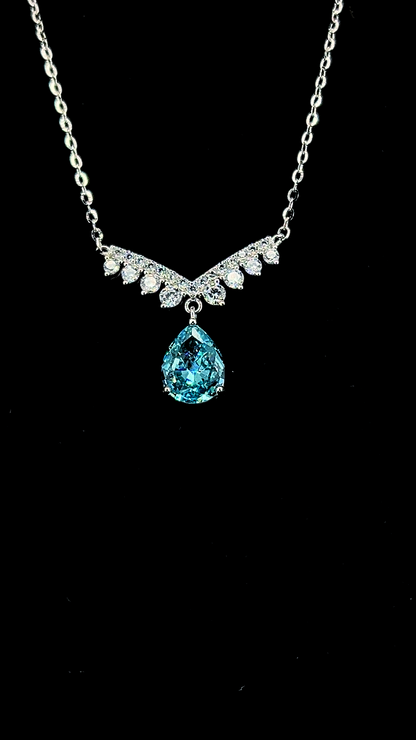 Blue pear-shaped Cubic Zirconia teardrop necklace with white CZ crown bar in BIS Hallmarked 925 sterling silver by The White Kala