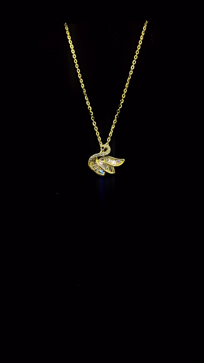 Gold plated 925 sterling silver baguette Cubic Zirconia swan wing pendant necklace with round CZ micropavé bail — The Golden Swan by The White Kala