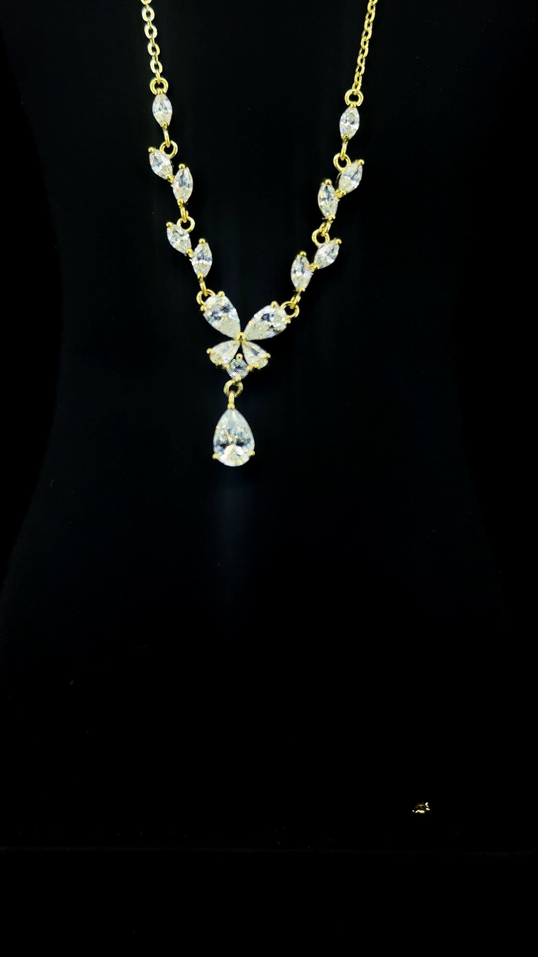Gold plated 925 sterling silver marquise CZ station necklace with floral cluster and pear CZ teardrop drop — The Golden Garland by The White Kala