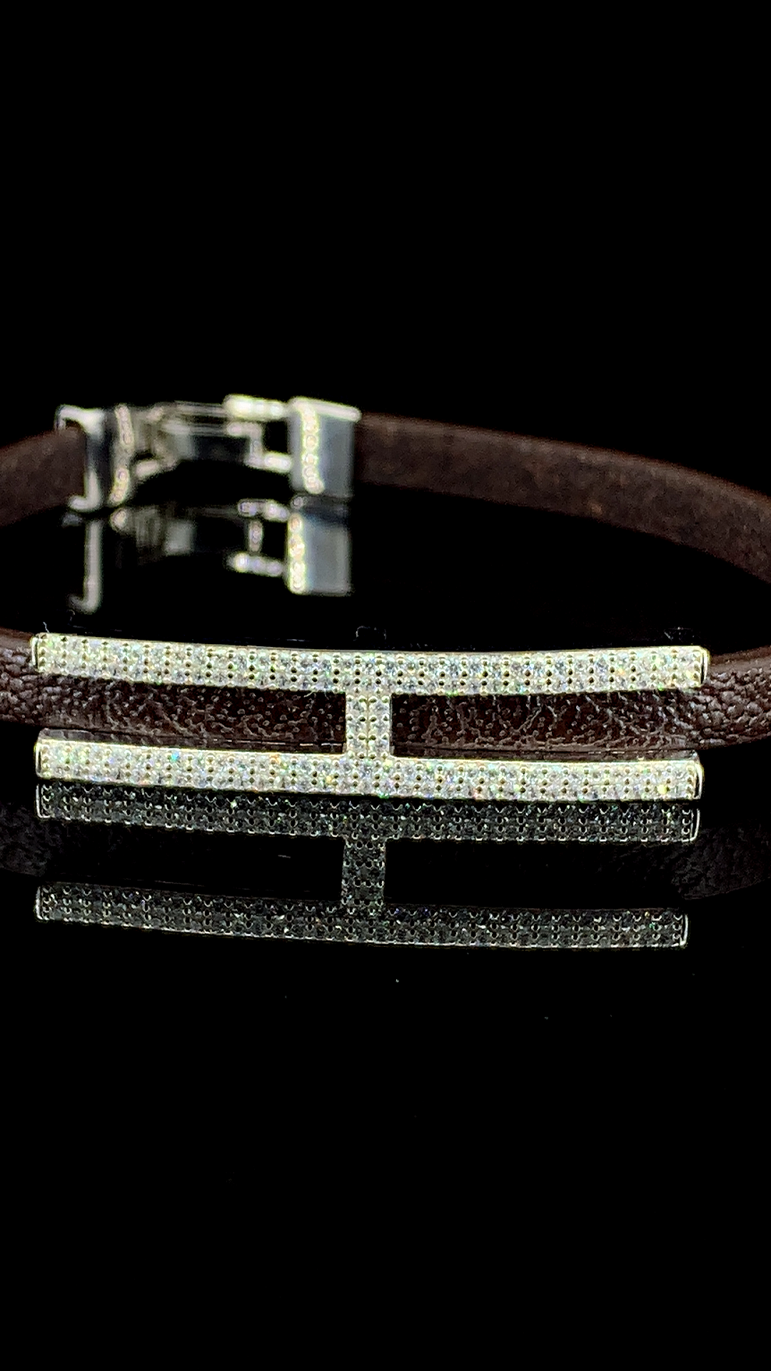 925 sterling silver H-bar bracelet with sparkling cubic zirconia stones on a brown leather strap by The White Kala.